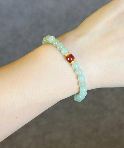 6mm Nephrite Jade Bracelet with Red Agate Accent