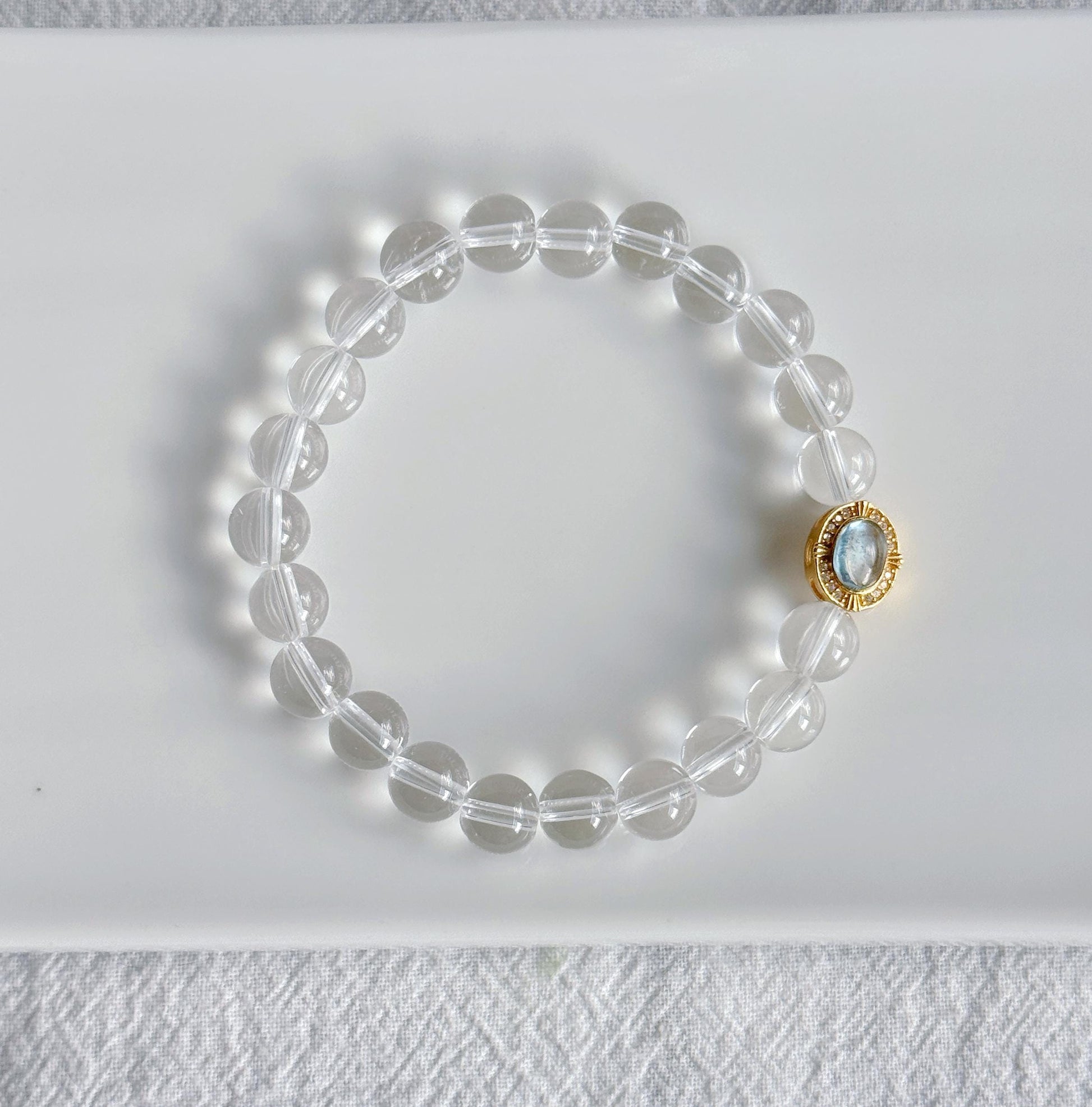 8mm Clear Quartz Beaded Bracelet with Aquamarine Charm | Clarity & Calm